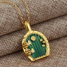 Gold Hobbit Hole, Lord Of The Rings Pendant Locket Necklace - Green Door Hobbit Party, Pendant Locket, Hobbit Hole, Green Door, Necklace Green, Funky Jewelry, Door Color, Fantasy Jewelry, Green Necklace