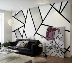 a living room with black and white decor