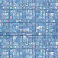 a blue mosaic tile wall with small squares