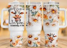 three travel mugs with flowers on them and the words live love everything is me