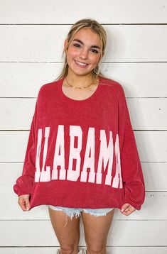 The Alabama Crimson Long Sleeve Top is oh-so comfy and oversized. With a crewneck style and long drop shoulder sleeves, you'll be feeling cozy and stylish. Plus, in the bold and bright Alabama crimson red, you'll stand out in any crowd. It's a must-have for any fan or fashionista! Cozy Red Sweatshirt With Ribbed Cuffs, Long Sleeve Sweater For College In Fall, Cozy Red Tops With Ribbed Cuffs, Long Sleeve Fall Sweater For College, Red Long Sleeve Top With Ribbed Neckline, Collegiate Sweater For Game Day In Fall, Collegiate Fall Sweater For Game Day, Red College Sweatshirt For Fall, Collegiate Style Sweater For Game Day In Fall