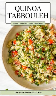 quinoa tabbouleh with carrots, celery and red peppers in a white bowl