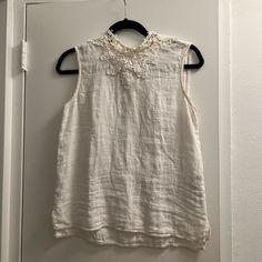 Very Cute White Linen Top From Zara, Size Xs High Neck With Very Nice Embroidery Around The Neckline, Front & Back. Never Worn! Fitted Linen Top With Floral Embroidery, Embroidered Fitted Linen Tops, Chic Embroidered Top With Lace Trim, Elegant Linen Tops With Floral Embroidery, Fitted Embroidered Linen Tops, Chic Embroidered Fitted Top With Lace Trim, Sleeveless Linen Top With Lace Trim, Summer Linen Tops With Lace Trim, Chic Linen Top With Floral Embroidery