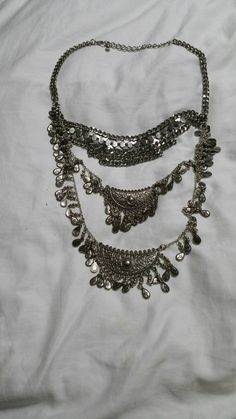 Silver Toned Metal Tear Drop Bead Leaf Style  28 inch Bib Necklace Costume Jewelry This is priced to sell.    Very decorative.  It a wonderful find. The bib measures 5 inches long and 7 inches wide. Check out our shop for monthly specials. We have a variety of items for every taste. Combine several of our items together to save on shipping. If you have any questions please do not hesitate to ask. I will ship outside of the US, just request a quote. Happy Shopping. I will work around the priority Costume Jewelry Metal Beaded Necklaces For Festivals, Metal Beaded Chain Necklace For Festivals, Bohemian Metal Layered Necklace With Beaded Chain, Bohemian Multi-strand Long Metal Necklace, Bohemian Multi-strand Metal Long Necklace, Bohemian Silver Layered Metal Necklace, Bohemian Long Layered Metal Necklace, Bohemian Silver Layered Necklace, Bohemian Long Chain Layered Necklace