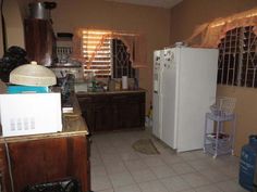 the kitchen is clean and ready for us to use in its new owner's house