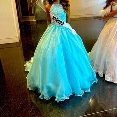 This Gown Was Worn Once For National Pageant In Great Condition Princess Style Blue Dress For Debutante Ball, Royal Blue Quinceanera Gown, Fitted Blue Ball Gown Pageant Dress, Blue Ball Gown Pageant Dress, Blue Princess Style Floor-length Gown, Blue Ball Gown For Pageants, Blue Ball Gown For Pageant, Light Blue Ball Gown For Pageant, Blue Princess Gown For Pageants