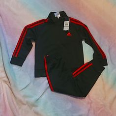 Nwt Adidas Black With Red Stripes Two Piece Track Suit. Little Boys Size 4 (Xs) Sporty Red Long Sleeve Set, Red Long Sleeve Sports Sets, Adidas Fitted Long Sleeve Sets, Red Sports Sets For Winter, Sporty Fitted Adidas Sets, Red Winter Sports Sets, Fitted Red Playwear Sets, Adidas Fitted Playwear Sets, Adidas Fitted Sets For Playwear