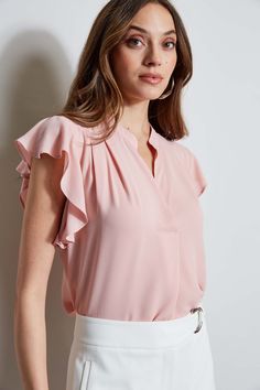 The soft cap sleeves lend a femme twist to this luxe georgette top. With its contour pleat detail neckline, it is perfect for layering with your favorite blazer or wearing on its own. T-Tahari Short Sleeve V-Neck Top Runs true to size. Model is 5'9" and wearing size S Dry Clean Only Imported Style #: THF44013 Georgette Tops, Cropped Wide Leg Pants, Running Tops, V Neck Tops, Flutter Sleeve, Shirt Sleeves, Cap Sleeves, Wide Leg Pants, Sleeve Shirt