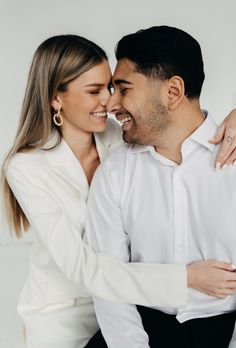 Couple takes engagement photos in studio in all white attire Couple Luxury Aesthetic, Indoor Photo Studio Ideas, Zhest Photo Couple, Pre Wedding Studio Ideas, Couple Shoot Poses Studio, Engagement Pictures Indoors, Minimalist Pre Wedding Shoot, Picture Family, Couples Shoot Studio