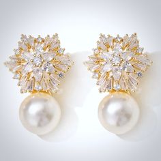 two pairs of pearl and diamond earrings