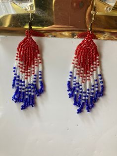 Beaded United States flag earrings. Perfect for anyone specially somebody patriotic. Blue Patriotic Earrings For Independence Day, Patriotic Blue Earrings For Independence Day, Patriotic Multicolor Dangle Jewelry, Patriotic Earrings For 4th Of July, Patriotic Drop Earrings For 4th Of July, Patriotic 4th Of July Earrings, Patriotic Blue Beaded Earrings, Patriotic Dangle Earrings For Independence Day, Patriotic Multicolor Earrings For Independence Day