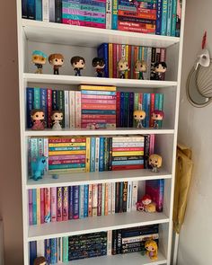 a book shelf filled with lots of books