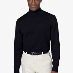 A luxurious standout that adds warmth, volume, and flair to anything you pair it with, this soft knitted layer features tapered edges and a thickly ribbed mock neck collar. The Navy, Neck Collar, Mock Neck, Knitwear, Cashmere, Wool, Navy, Collar