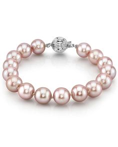 This bracelet consists of 10-11mm AAA quality freshwater pearls with 'Very High' luster, our highest grade available. 

The brilliant pink color of this bracelet would also go great with one of our exquisite lavender freshwater necklaces. 

The pearl bracelet is affixed with a beautiful 14K white or yellow gold clasp of your choice. Elegant Pink Round Bead Bracelet, Elegant Pink Pearl Bracelet, Classic Pink Bracelets, Formal Pink Pearl Bracelet, Elegant Pink Pearl Bracelet As A Gift, Elegant Pink Pearl Bracelet Gift, Elegant Pink Pearl Bracelet For Gifts, Pink Pearl Bracelet With Round Beads For Formal Occasions, Elegant Pink Pearl Bracelet With Round Beads