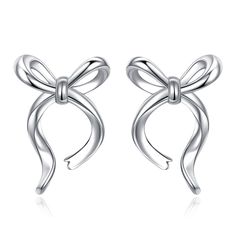 PRICES MAY VARY. Sterling silver earring featuring bow ribborn,very simple and chic design for women everyday wearing Women Earring Material:S925 Sterling Silver,plating with 2 layered expensive 14k white gold to prevent from silver oxidation,high polishing make this earring shine soft charming luster ;tarnish resistant, nickel-free, lead-free.Won't Turn Your Ear Red or Itchy. Bow Stud Earring Size:15*10.3mm;total weight:1.85g;light weight and comfortable wear even sleep with them on. Free Exqui Minimalist Silver Jewelry With Bow, Unisex Earrings, Silver Bow, Christmas Gift Jewelry, Sterling Silver Flowers, Silver Earring, Christmas Women, Stud Earring, Sterling Earrings