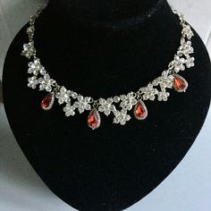 Regency Revival! Dress to impress! This is a Rhinestone necklace with Ruby red coloured drops. Good to go with your own great outfit for your next Jane Austen Ball, Bridgerton event Or at a Wedding, Birthday, Christmas or New Year's do. Party Ruby Necklaces With Sparkling Stones, Red Jeweled Bridal Necklace For Party, Ruby Necklaces With Sparkling Stones For Party, Red Dangle Necklaces For Party, Party Ruby Necklace With Sparkling Stones, Red Jeweled Jewelry Sets For Party, Red Party Jewelry With Jewels, Red Crystal Jewelry For Party, Teardrop Jeweled Party Necklaces