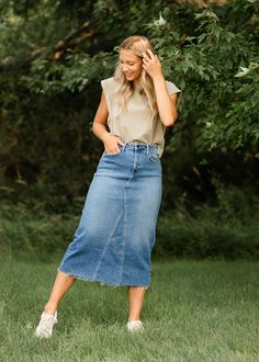 Let us introduce you to the denim skirt you'll want to wear with everything, the Lee A-Line Raw Hem Midi Skirt! This stunning midi denim skirt is an Inherit Design made in the USA! Crafted from high quality, stretchy, medium wash denim that is super soft and will keep you comfortable all day long. The A-line fit is walkable, modest, and on-trend with a raw hem. This sustainable, modest, American-crafted skirt is a true seasonless staple you will wear for years to come! Style | Midi, Denim Color Straight Leg Skirt With Frayed Hem For Fall, Relaxed Fit Denim Skirt For Fall, Relaxed Denim Skirt For Fall, Denim Relaxed Fit Skirt For Fall, Relaxed Fit Straight Leg Denim Skirt For Fall, Fall Relaxed Straight Leg Denim Skirt, Fall Denim Skirt With Lined Detail, High Rise Relaxed Fit Skirt For Fall, Fall Denim Lined Skirt