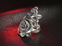 "Charming silver rose ring. Hallmark: 925 Approximate weight: 6.2 g Width: 1.14 inches Shipping: - we prepare our orders ready for shipping in 3-7 business days, all items are made to order, they are not kept in stock; - we will provide tracking number as soon as order will be shipped. EXPRESS shipping: if you are interested in FAST delivery, we offer very fast and high quality \"door to door\" service by UPS Express. Delivery: within Europe - 1 business day, within USA, Canada and Australia - 1 Elegant Sterling Silver Rings With Roses, Elegant Silver Rings With Rose Details, Silver Rose Design Ring, Silver Ring With Rose Design, Silver Rings With Rose Design For Formal Occasions, Silver Rose Ring Jewelry, Silver Rose Ring, Gothic Rose, Rose Ring