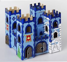 a blue and white castle made out of cardboard