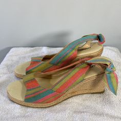 New Without Tags 3 Inch Wedge Heel, Size: 10m, Slingback Style With Bow, Fabric Upper Balance Man Made Material, Colors: Multi- Colored Stripes Of Red Pink Green Blue, In Excellent Condition Summer Beach Slingback Wedge Sandals, Summer Beach Fabric Wedge Sandals, Fabric Wedge Sandals For The Beach, Multicolor Wedge Sandals For Beach Season, Adjustable Multicolor Wedge Sandals For Vacation, Adjustable Multicolor Wedge Sandals For Spring, Casual Adjustable Multicolor Wedge Sandals, Casual Multicolor Adjustable Wedge Sandals, Multicolor Slingback Sandals For Summer