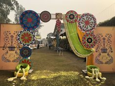 an outdoor area decorated with flowers and decorations