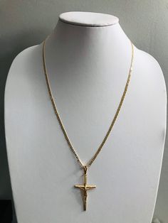 "18K GOLD FILLED CROSS NECKLACE . FOR GOOD LUCK,PROTECTION,HEALTH AND ANY KIND OF DIFFICULTY .22\" LONG CHAIN. PENDANT SIZE: 55 X 28 mm 18K GOLD FILLED CADENA DE CRUZ . PARA PROTECCION,BUENA SUERTE,SALUD Y PARA CUALQUIER CASO DIFICIL.22\" LARGO CADENA. TAMANO DEL DIJE: 55 X 28 mm" Gold Plated Crucifix Jewelry With Adjustable Chain, Gold Crucifix With Figaro Chain Jewelry, Gold Plated Crucifix Necklace Tarnish Resistant, Gold Plated Tarnish Resistant Crucifix Necklace, Gold 14k Gold-filled Curb Chain Jewelry, Gold-plated Tarnish-resistant Crucifix Necklace, Gold Crucifix Necklace In 14k Gold, Yellow Gold Cross Jewelry With Figaro Chain, 14k Gold Cross Figaro Chain Jewelry