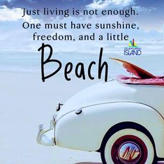 a white car parked on top of a beach next to the ocean with a quote