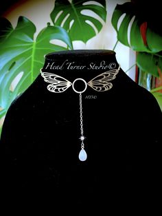 "*✧･ﾟ:*Handmade Silver Mystic Moonstone Flying Fairy Butterfly Wing Lariat Choker*:･ﾟ✧* Perfect for a Fairy Princess or a Fairy Goddess! Create your own Fairy tale by making a statement and turning heads all at the same time! This gorgeous lariat choker is enchanting! *:･ﾟ･ﾟ✧💚 ✧･ﾟ: *✧･ﾟ:* ✨P R O D U C T I O N - T I M E ✨ Each of my lovingly handcrafted pieces is designed, assembled and packaged with the upmost care. Please allow 1-3 business days for production. If you have a specific deadline, Handmade Fantasy Body Jewelry For Festivals, Fairycore Jewelry For Parties, Adjustable Fairycore Jewelry For Parties, Silver Fairy Grunge Necklaces For Festivals, Fairy Style Silver Jewelry For Festival, Silver Fairy Style Jewelry For Festival, Silver Fairy Jewelry For Festivals, Fairycore Adjustable Choker Jewelry, Fairy Style Adjustable Wedding Jewelry