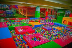 an indoor play area with lots of balls