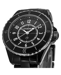 The sleek jet black Chanel J12 33mm Ceramic Watch is a must-have for stylish Instagrammers. This top brand watch features a stunning black ceramic case and matching ceramic strap that makes a bold statement. With sapphire crystal, a uni-directional bezel and 200m water resistance, it's durable enough for any lifestyle. Feminine silver Arabic numerals and hands pop against the high-contrast black lacquered dial. Wear it to take your OOTD photos to the next level while keeping on-trend with the lu Designer Black Diamond Watch With Diamond Hour Markers, Black Diamond Watch With Round Dial, Black Diamond Watch With Diamond Hour Markers, Modern Black Diamond Watch, Modern Black Round Diamond Watch, Black Diamond Watch With Subdials, Luxury Black Diamond Watch With Metal Dial, Luxury Black Diamond Watch With Round Dial, Luxury Black Jewelry And Watches With Diamond Hour Markers