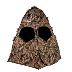 an image of a hunting blind with two large eyes on it's face and the bottom