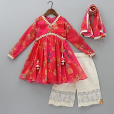 Girls Indian Ethnic Wear Long Sleeve Sets With Tassels For Navratri, Traditional Festival Sets With Tassels, Summer Festive Sets With Tassels, Festive Summer Sets With Tassels, Traditional Spring Sets With Back Tassel Tie-up, Red Bohemian Floral Print Sets, Bollywood Style Long Sleeve Sets With Tassels, Traditional Pink Sets With Tassels, Traditional Lace Trim Set For Spring