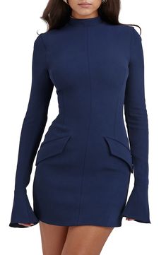 Long fluted sleeves frame this stem-showing dress designed in a close-fitting silhouette with a high neckline. Exclusive retailer Hidden back-zip closure Mock neck Long sleeves Decorative front flap pockets 96% viscose, 4% elastane Dry clean Imported Fitted High Neck Bodycon Dress With Back Zipper, Fitted Blue Bodycon Dress With Back Zipper, Dark Blue Mini Dresses, Club Party Dresses, Mini Robes, Body Con Dress, Mini Dresses For Women, Blue Mini Dress, Women Cargos