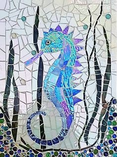 a sea horse is depicted in this mosaic