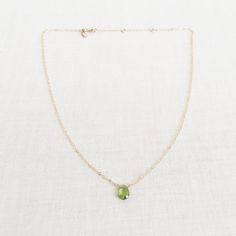 "This is a peridot necklace made of genuine high quality faceted peridot. There are gold filled ,sterling silver and 14kt gold chain you can choose from. Each necklace has 2\" extender. There are 2 sizes that you can choose from 14\"-16\" and 16\"- 18\" in gold filled or sterling silver. 14k gold necklace will be in single size without extender.This is a August birthstone necklace. Peridot jewelry is light weight and elegant. This green peridot is around 1 carats. The green stone necklace is gre Peridot Faceted Jewelry For May Birthstone, Faceted Peridot Jewelry For May Birthstone, Peridot Gemstone Pendant Necklace, Green Peridot Necklace For May Birthstone, Green Peridot Pendant Necklace, Dainty Green Peridot Jewelry, Peridot Gemstone Necklace For May Birthstone, Oval Green Peridot Necklaces, Peridot Briolette Gemstone Jewelry