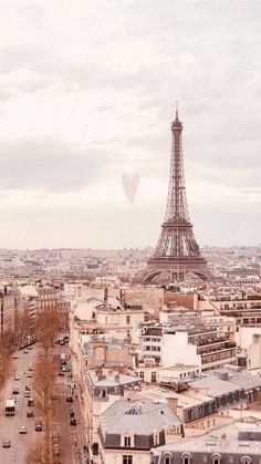 the eiffel tower in paris, france is seen from an aerial view point