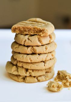 a stack of cookies sitting on top of a white table