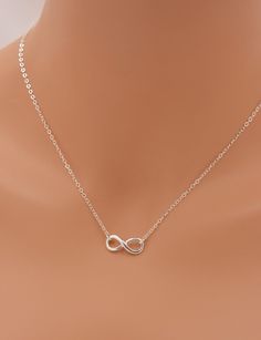 MADE WITH ALL SOLID STERLING SILVER PARTS - A GREAT KEEPSAKE This beautiful piece is made using solid sterling silver for a quality necklace. I use a sterling silver infinity charm set on a sterling silver chain. The necklace closes with a spring clasp. The infinity charm is the perfect size for a refined look. Comes in a gift box, perfect for gift-giving. **SIZING - PLEASE READ: Select your necklace size at checkout. Note that necklaces will fit differently depending on a person's size. Please Silver Infinity Clavicle Chain Jewelry, Nickel-free Silver Infinity Jewelry, Sterling Silver Infinity Necklace With Adjustable Chain, Silver Infinity Clavicle Chain Necklace, Silver Infinity Necklace In Dainty Style, Silver Infinity Dainty Necklace, Silver Dainty Infinity Necklace, Silver Infinity Jewelry, Dainty Silver Infinity Necklace