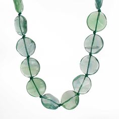 A gorgeous strand of hand knotted Fluorite gemstones! This is an endless strand 32" long, knotted using green silk thread. It makes a statement!100% Natural AAA Green Fluorite Gemstone BeadsBeads are about 20 mm DiameterNecklace is 32" Long, no clasp~ Slides easily over headGreen Silk ThreadArtisan Made in Texas, USAThoughtfully packaged in a signature kraft jewelry box ready to gift Fluorite Gemstone, Fluorite Necklace, Green Fluorite, Bead Shop, Green Silk, Silk Thread, Gemstone Beads, Hand Knotted, Jewelry Box