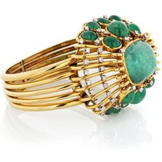 Behold the captivating allure of the Mauboussin Vintage 18K Yellow Gold Cabochon Green Emerald Cuff Bangle Bracelet! Picture yourself adorning your wrist with this exquisite piece of artistry, meticulously crafted to embody the timeless beauty and sophistication that Mauboussin is renowned for.At the heart of this bangle bracelet lies a resplendent square cabochon emerald, emanating a rich green hue that exudes elegance and charm. Its presence is further enhanced by the intricate openwork gold d Luxury Ornate Cabochon Bracelets, Luxury Yellow Gold Cabochon Bracelets, Luxury Yellow Gold Bracelets With Cabochon, Luxury Green Cuff Bracelet For Formal Occasions, Yellow Gold Cabochon Bracelets For Weddings, Formal Cuff Bangle Bracelet With 17 Jewels, Luxury Jeweled Bangle Bracelets, Luxury Jeweled Bangle, Luxury Yellow Gold Cuff Bracelet With Gemstone