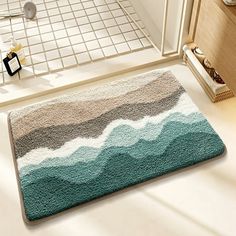 a bathroom rug that has waves on it