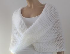 Ivory shawl, Winter wedding shawl, Bridal cape, Bridal wrap, Bridal shrug, Bridal shawl, Romantic wedding shawl, Wedding bolero, Mohair cape, Romantic wedding shawls and boleros, wedding shawl for bride and bridesmaids, White capes, Bridal wrap for winter wedding, Knit shawl, Knit wedding cape, Knit cape wrap sweater, Knitted shawl for wedding dress, Shawls and wraps This shawl is handcrafted and designed to be the perfect addition to any bridal dress and makes a wonderful gift. Perfect for laye Wedding Knit, Bridal Shawl Crochet, Shawl For Wedding, Wedding Dress Shawl, Mohair Shawl, Winter Wedding Shawl, Wedding Shawls, Shawl Winter, White Cape