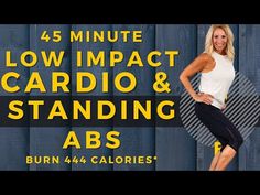 a woman standing in front of a blue fence with the words low impact cardio and standing abs