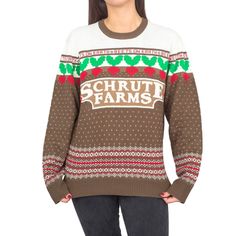 a woman wearing an ugly sweater with the words schrut farms on it's chest