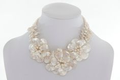 Handmade necklace of mother of pearl and fresh water pearls (cultured). Clasp made of rhodium plated brass. Nickel free, anti allergenic.  Measurements: total length: 18 in/45 cm ; Flower width: 8cm/ 3.14 in. Weight:  approx. 0.5 lbs/ 240 grams Free shipping ! White Stone Necklace, Necklace Princess, Necklace Shell, Princess Necklace, Flower Shorts, Mother Of Pearl Necklace, Fresh Water Pearls, Necklace White, Water Pearls