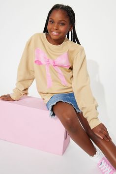 Available In Sand. Sweatshirt Crew Neck Long Sleeve Bow Screen Model Wears Size 10/12 Imported 60% Cotton 40% Polyester | Mini Call Me Sweetie Crew Neck Sweatshirt in Sand size 4/5 by Fashion Nova Cute Sweatshirt For Spring Playwear, Casual Spring Sweatshirt For Playwear, Casual Relaxed Fit Sweatshirt For Playwear, Cute Cotton Sweatshirt For Playwear, Fall Playwear Crew Neck Tops, Cute Cotton Playwear Sweatshirt, Crew Neck Tops For Playwear In Fall, Crew Neck Tops For Fall Playwear, Cute Cotton Sweatshirt