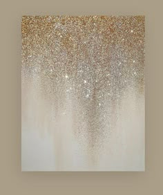 an abstract painting with gold and white glitters on the bottom, in shades of beige