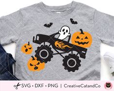 a gray shirt with a monster truck and pumpkins on it