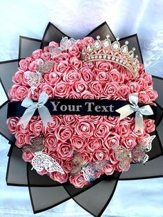 a heart shaped box with pink roses and tiara on the top that says your text