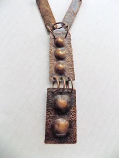 "I have owned this necklace since the 70's, and I am convinced it is a hand made artist studio piece. It reminds me of the late beatnik, early hippy art pieces I wore myself, over a black turtleneck, back in the day. The links are easy to bend by hand, if you want them to look all the same, but I like the mish mash look of this, and always got a lot of compliments when I wore it. Some call it Brutalist, and some say it is MCM. No signature or markings. Just a great statement piece! One of a kind Brutalist Pendant Necklace For Gift, Handmade Contemporary Metal Necklaces, Collectible Modernist Pendant Necklace, Handmade Contemporary Metal Necklace, Modern Bronze Metal Necklaces, Modernist Metal Jewelry With Large Pendant, Contemporary Handmade Necklace, Modern Bronze Metal Necklace, Unique Metal Necklace With Rectangular Pendant